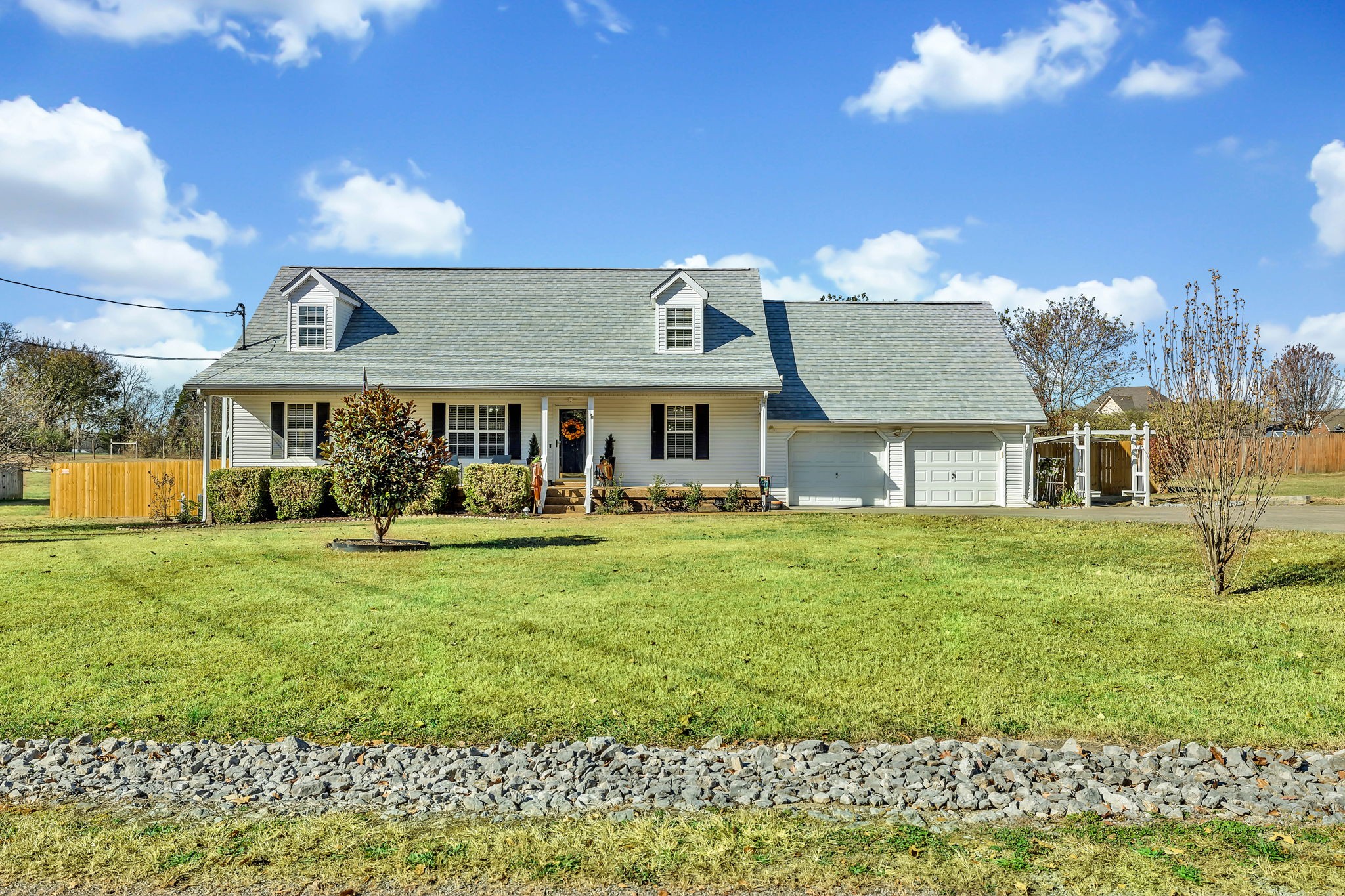 3941 Honeysuckle Way Chapel Hill, TN 37034 - Photo 1 of 38 a front view of a house with a garden