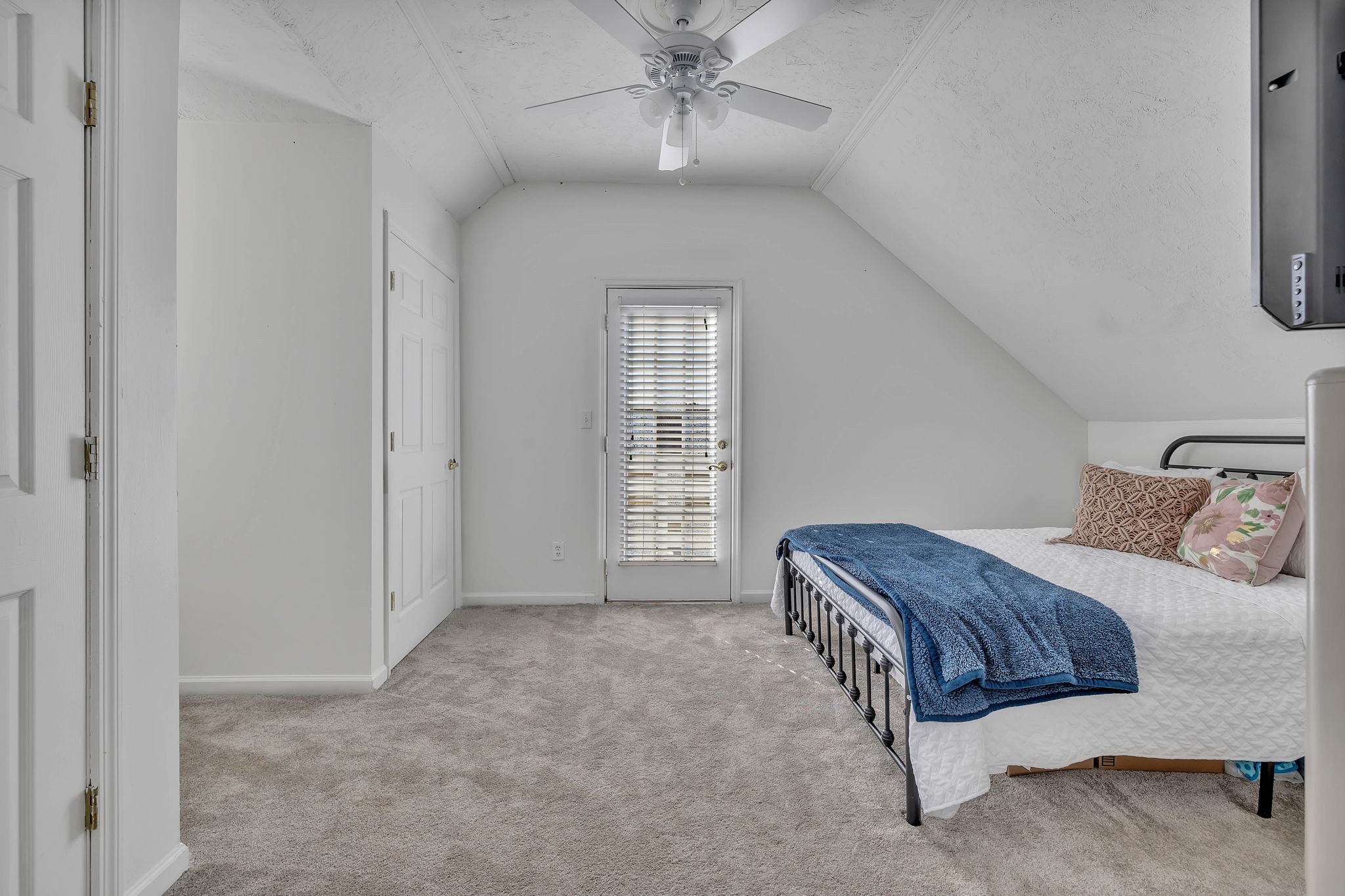 3941 Honeysuckle Way Chapel Hill, TN 37034 - Photo 27 of 38 a spacious bedroom with a bed and a chandelier