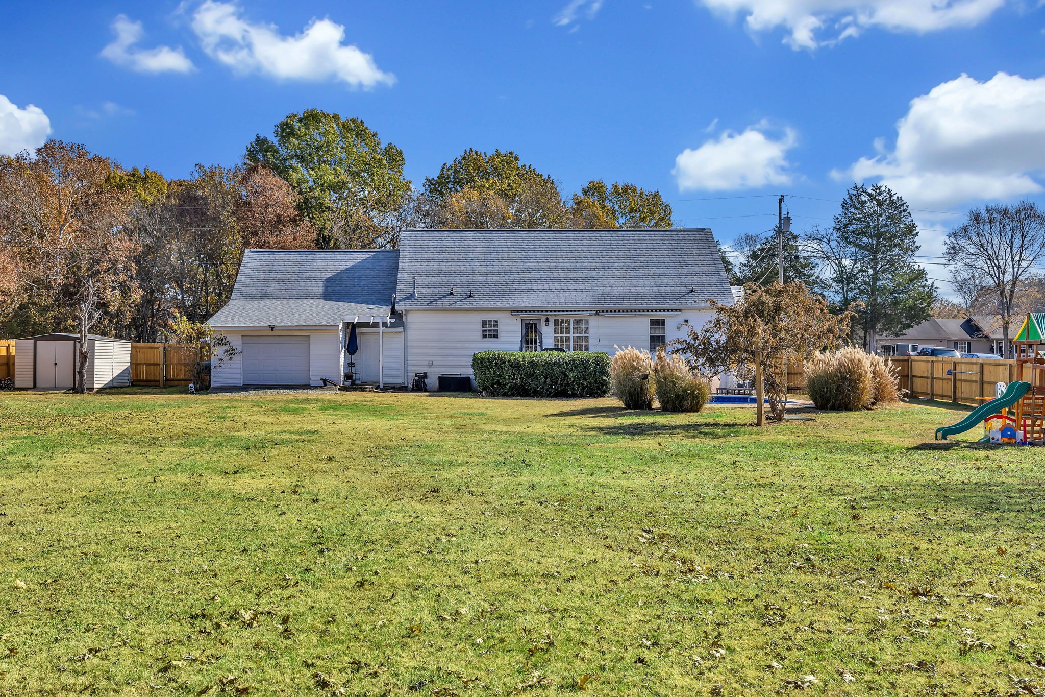 3941 Honeysuckle Way Chapel Hill, TN 37034 - Photo 38 of 38 a front view of a house with a yard and garage