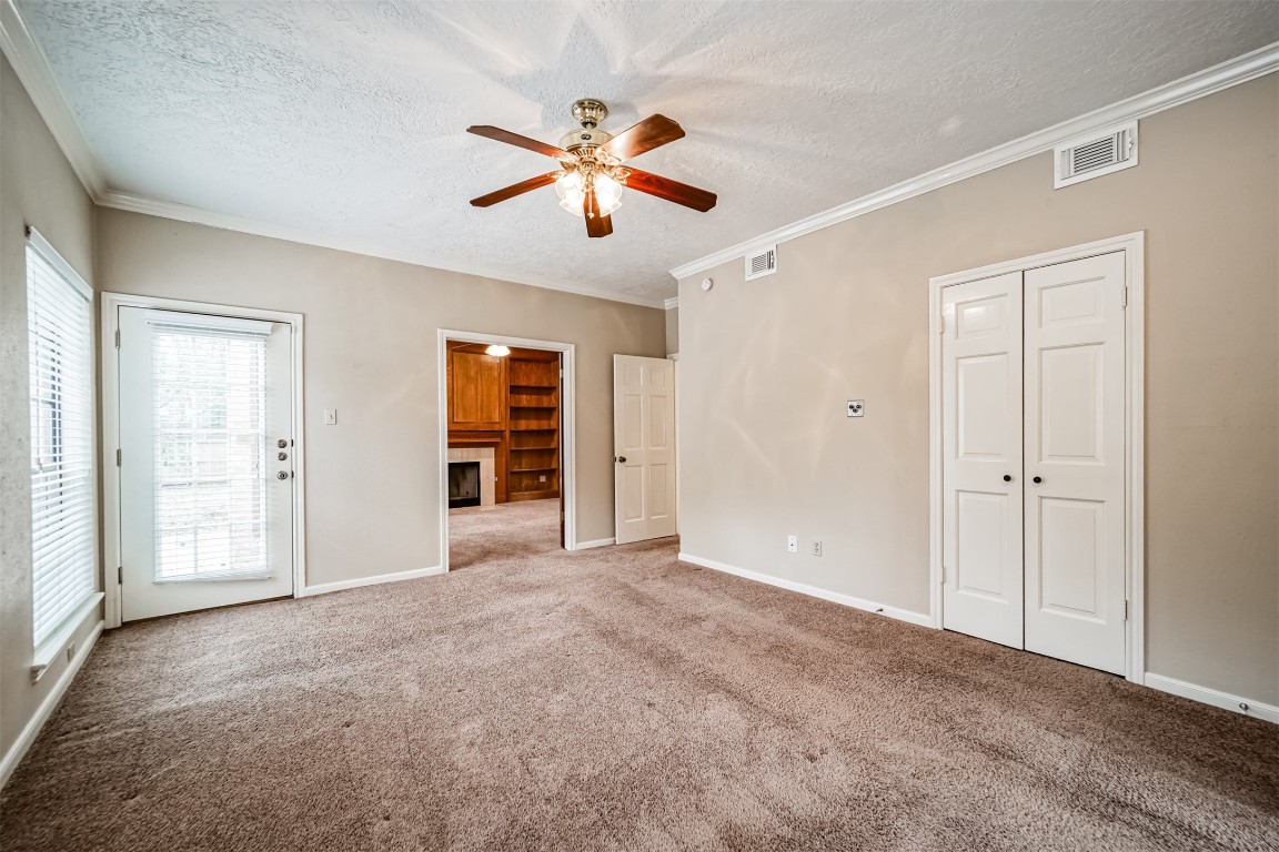 67 North Skyflower Court Spring, TX 77381 - Photo 21 of 45 a view of an empty room with closet and a window