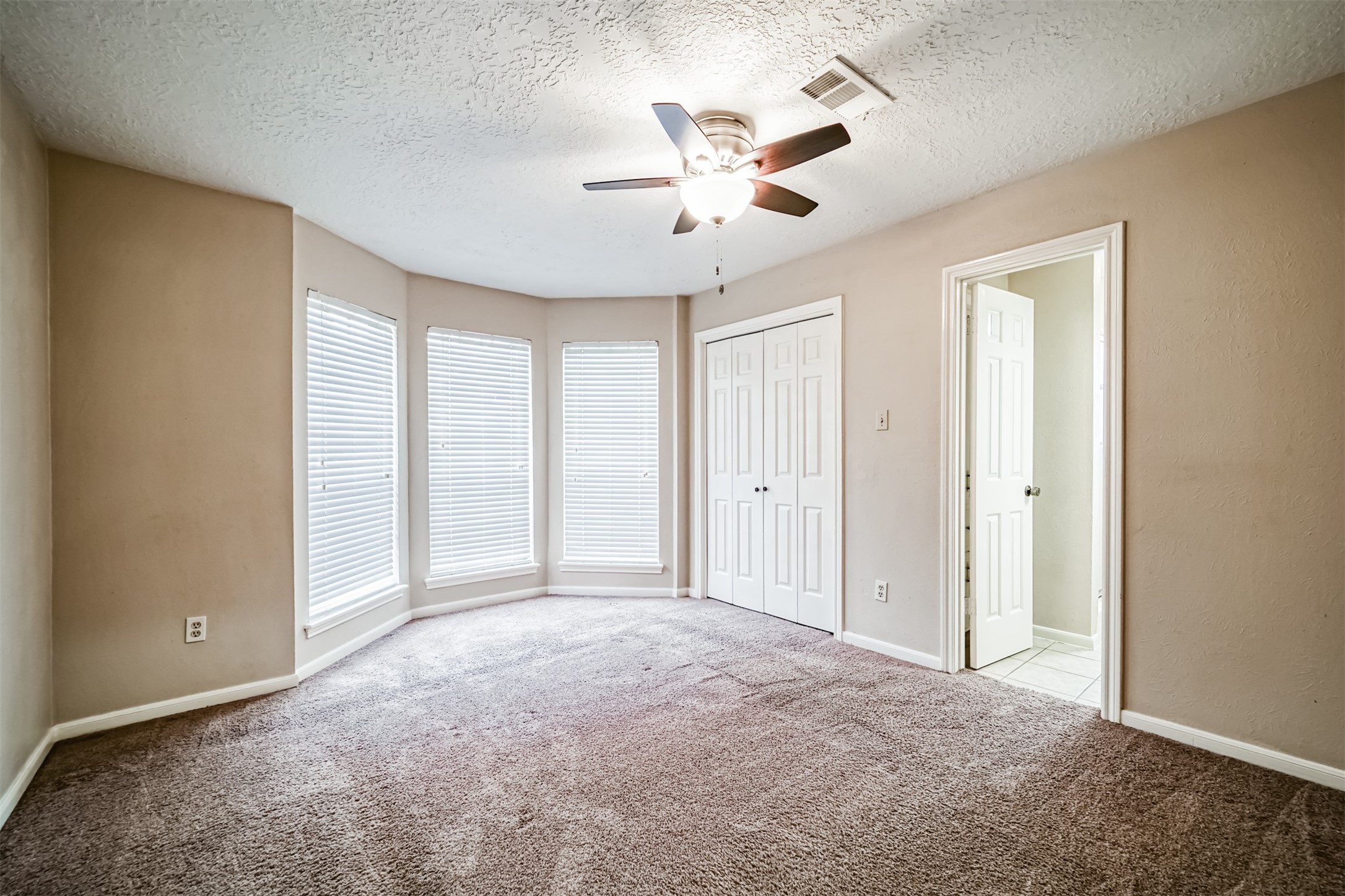 67 North Skyflower Court Spring, TX 77381 - Photo 37 of 45 a view of an empty room with a window