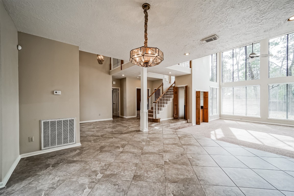 67 North Skyflower Court Spring, TX 77381 - Photo 9 of 45 a view of an empty room with a window