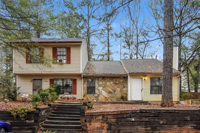 a front view of house with street