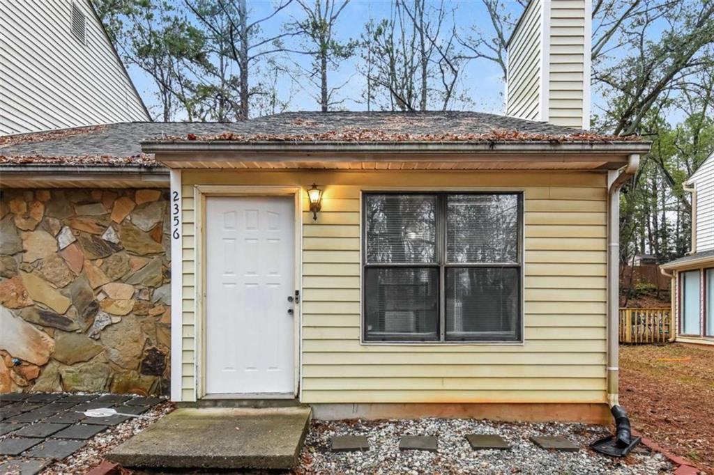 2356 Wingfoot Place Decatur, GA 30035 - Photo 19 of 20 a view of a entrance door of the house