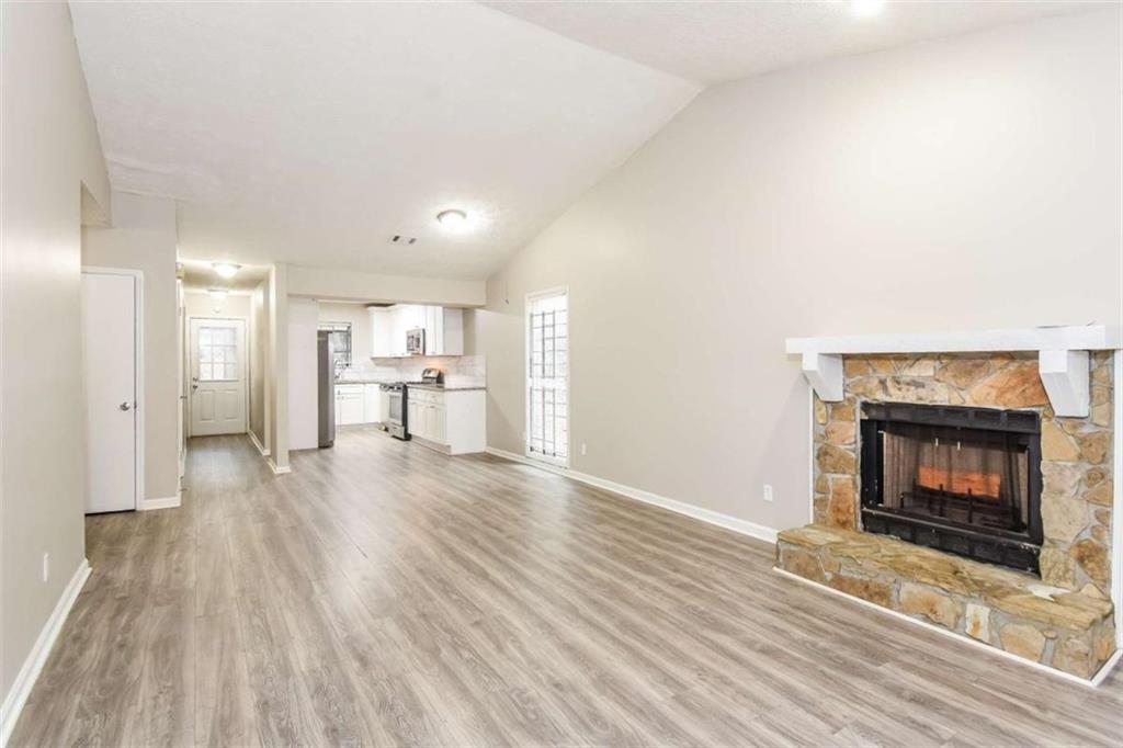2356 Wingfoot Place Decatur, GA 30035 - Photo 5 of 20 a view of a livingroom with a fireplace