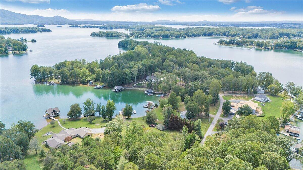 2544 Patmos Church Road Huddleston, VA 24104 - Photo 5 of 33 a view of a lake with houses in the back