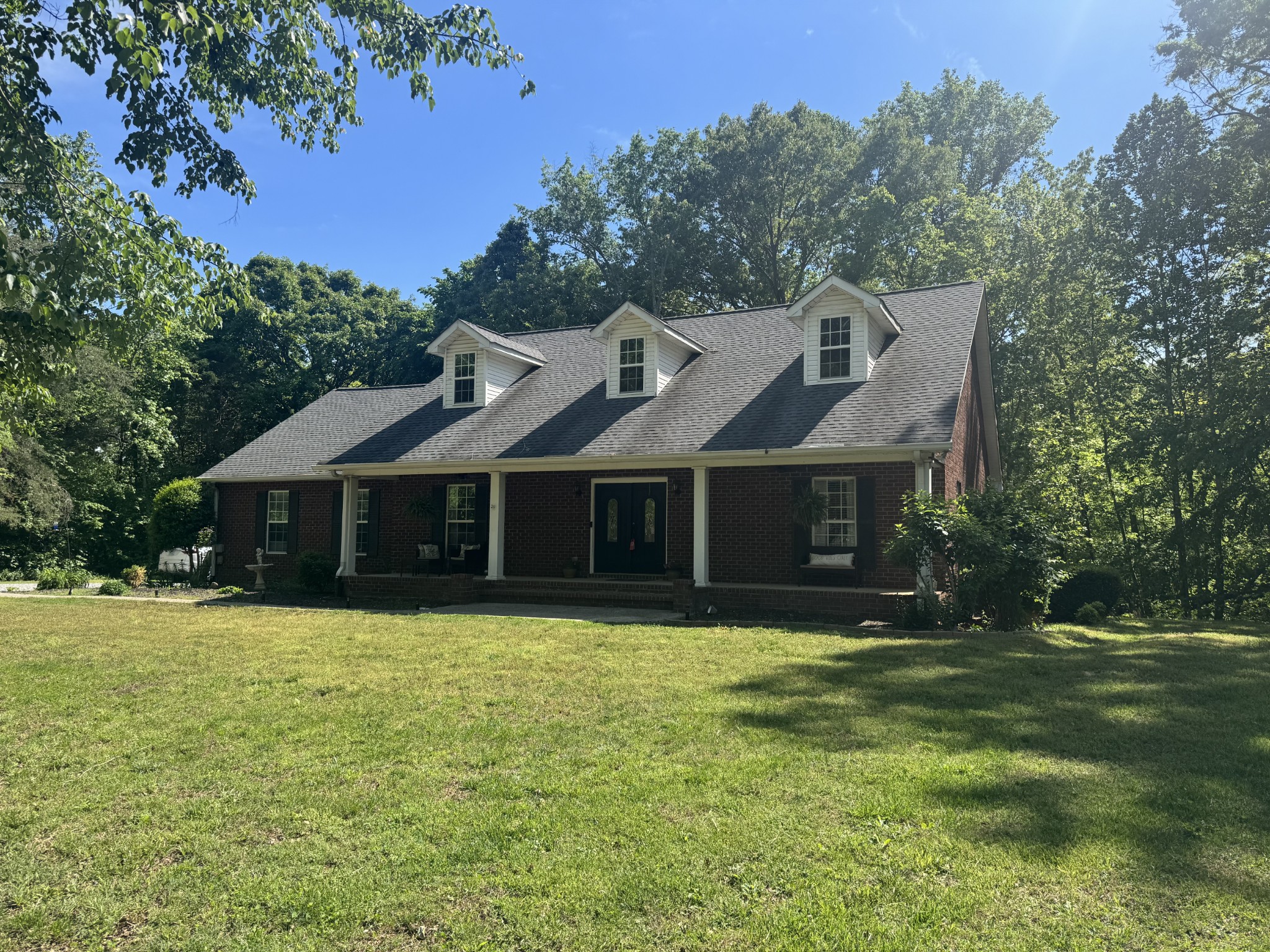 119 Christi Place Pleasant View, TN 37146 - Photo 3 of 62 a front view of a house with a yard