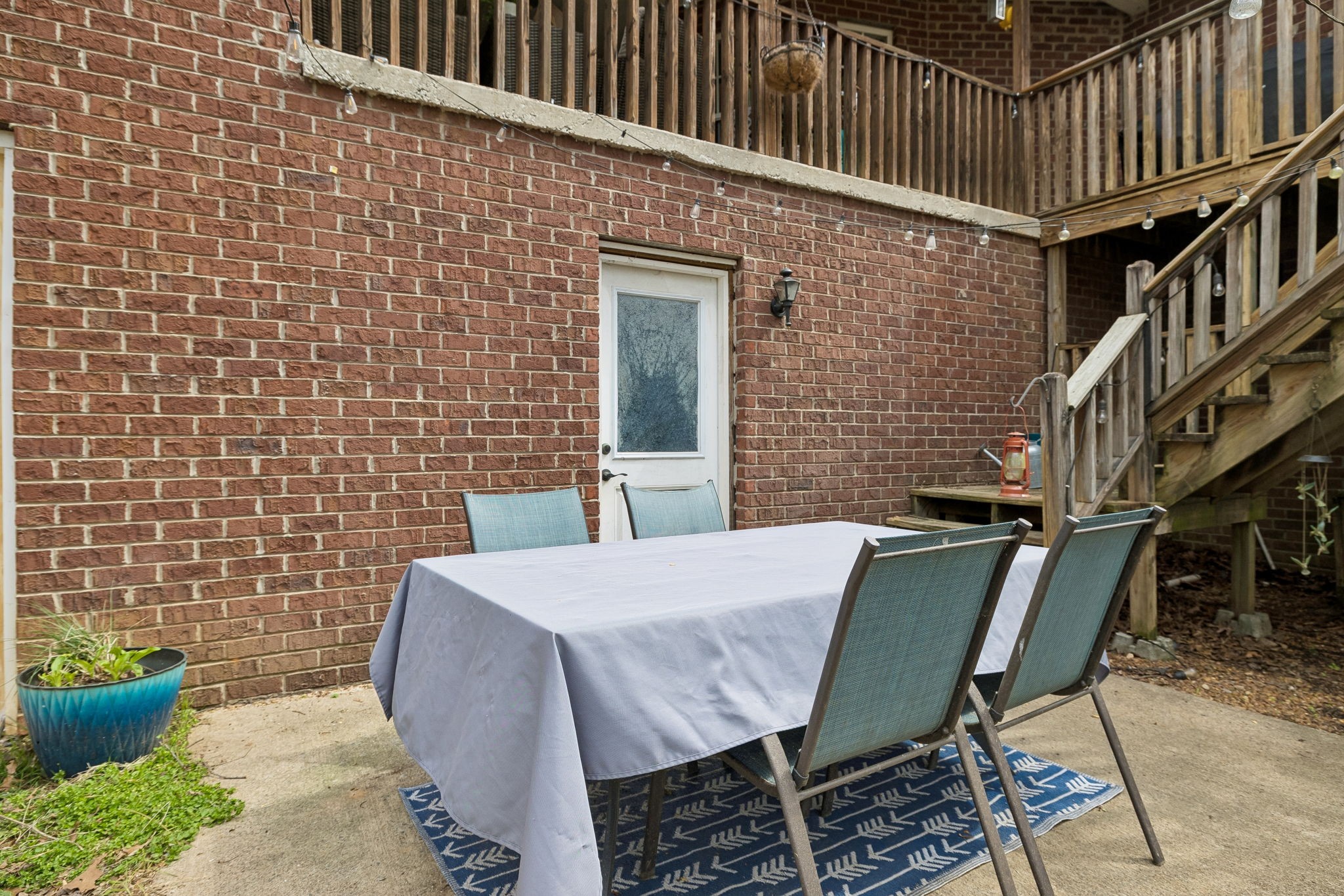 119 Christi Place Pleasant View, TN 37146 - Photo 39 of 62 a view of a patio with table and chairs