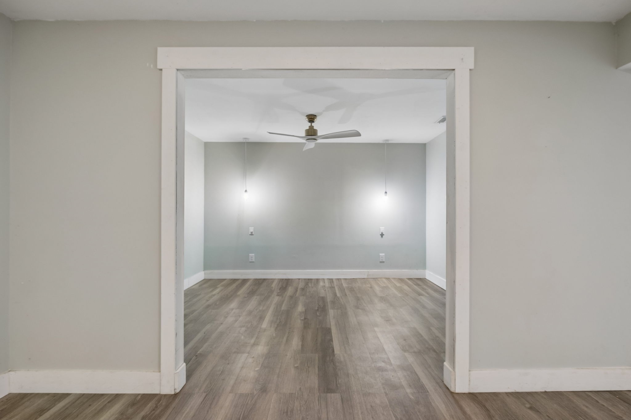119 Christi Place Pleasant View, TN 37146 - Photo 47 of 62 a view of an empty room with wooden floor and a window