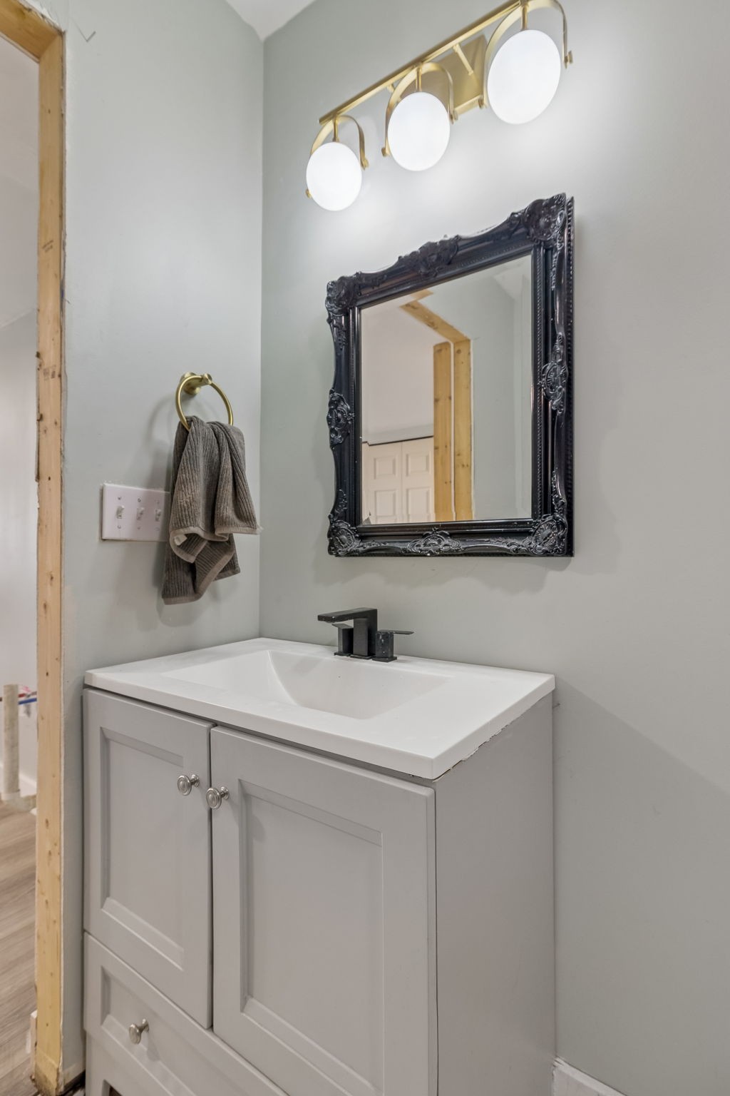 119 Christi Place Pleasant View, TN 37146 - Photo 50 of 62 a bathroom with a sink vanity and mirror