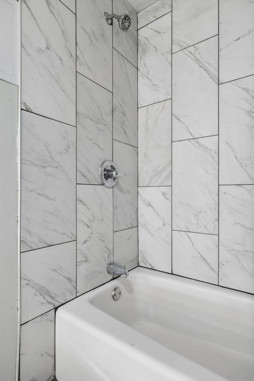 119 Christi Place Pleasant View, TN 37146 - Photo 52 of 62 a bathroom with a bathtub