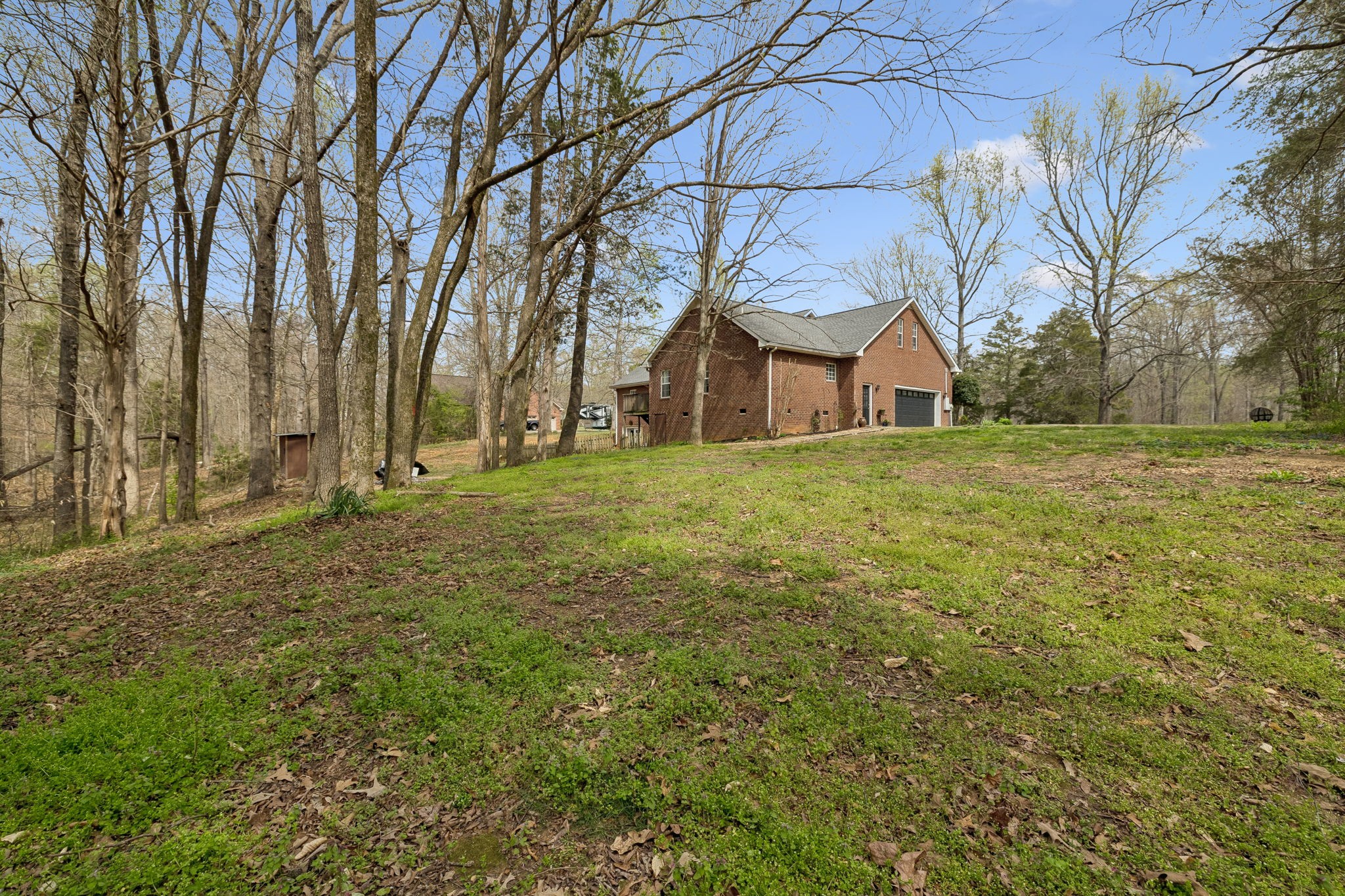 119 Christi Place Pleasant View, TN 37146 - Photo 58 of 62 a view of a house with a yard