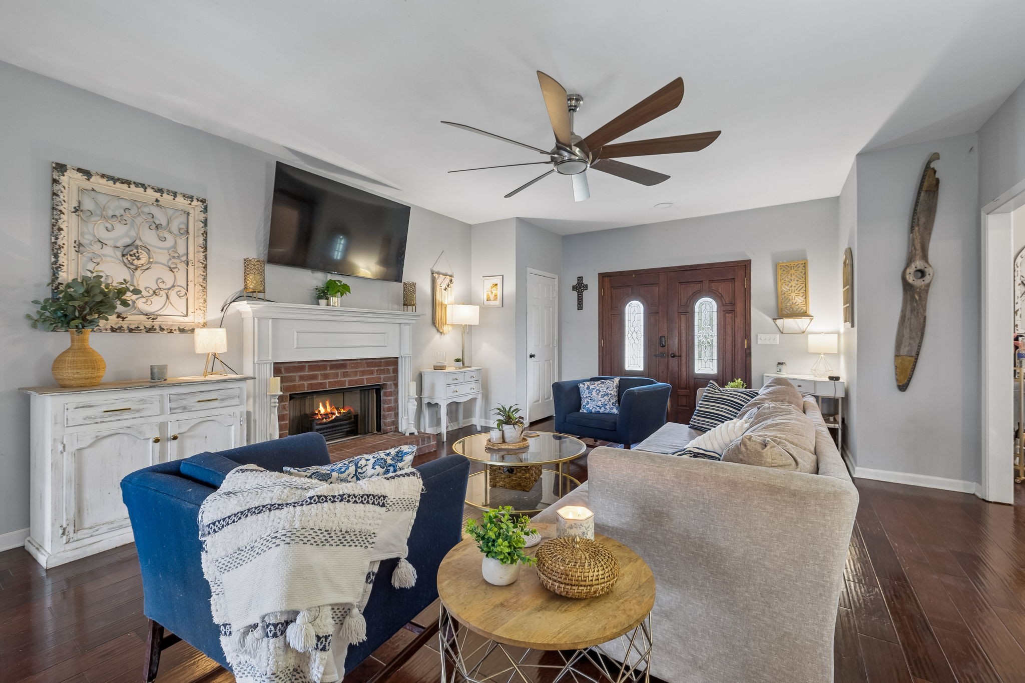 119 Christi Place Pleasant View, TN 37146 - Photo 7 of 62 a living room with furniture a fireplace and a flat screen tv