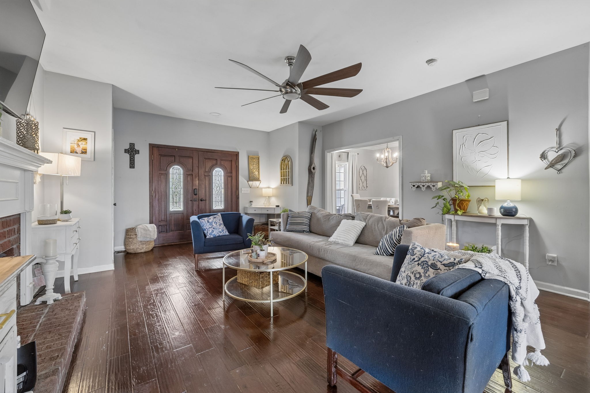 119 Christi Place Pleasant View, TN 37146 - Photo 10 of 62 a living room with furniture a large window and wooden floor