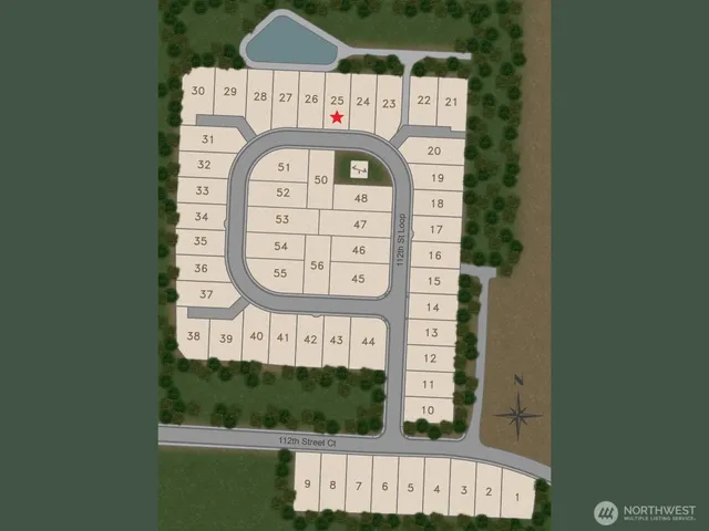 an aerial view of a house with a garden