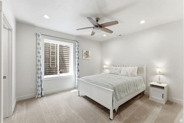108 West Monte Rosa Lane Midway, UT 84049 - Photo 31 of 48 Bright bedroom featuring light neutral walls and coordinating carpet flooring