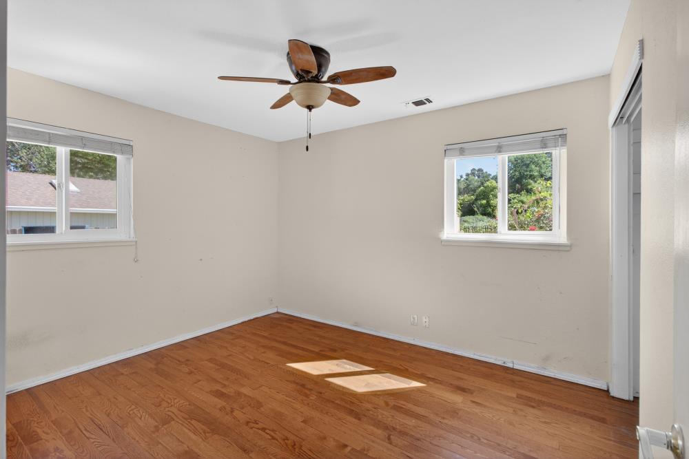 8780 Elm Avenue Orangevale, CA 95662 - Photo 11 of 23 a view of empty room with wooden floor and fan