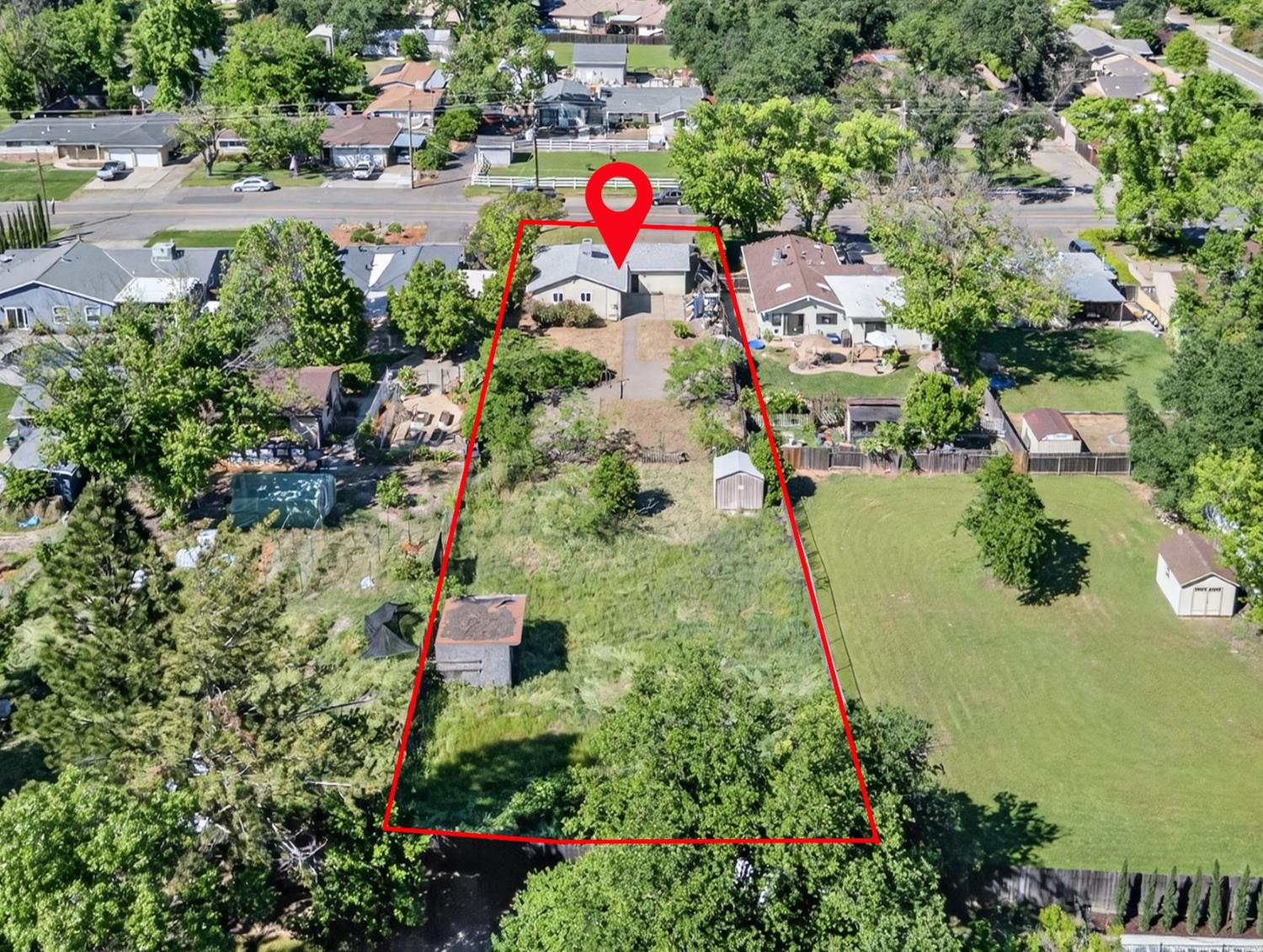 8780 Elm Avenue Orangevale, CA 95662 - Photo 2 of 23 an aerial view of a house with a yard and lake view