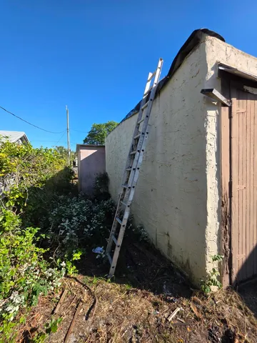 a view of a porch with seating space