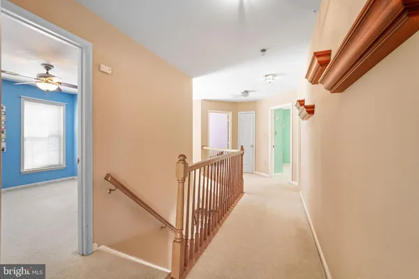 a bedroom with bed and window