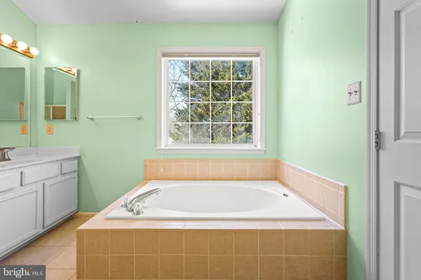 a view of a chairs and table in the patio