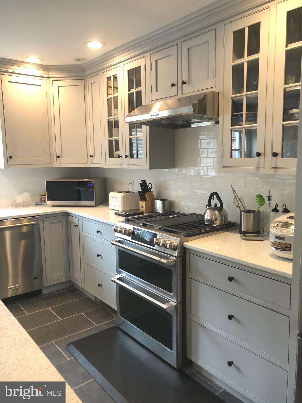 456 Irvington Road Drexel Hill, PA 19026 - Photo 8 of 24 Renovated Kitchen With Stainless Steel Appliances