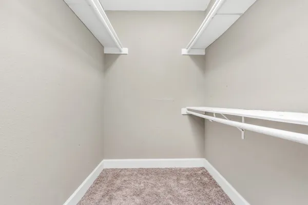 a view of small space with racks on the wall