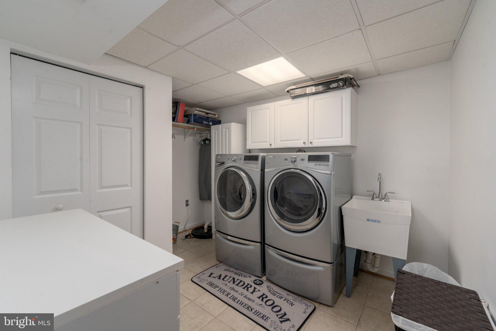 202 St Marys Road Essex, MD 21221 - Photo 26 of 33 Modern laundry room with sleek appliances.