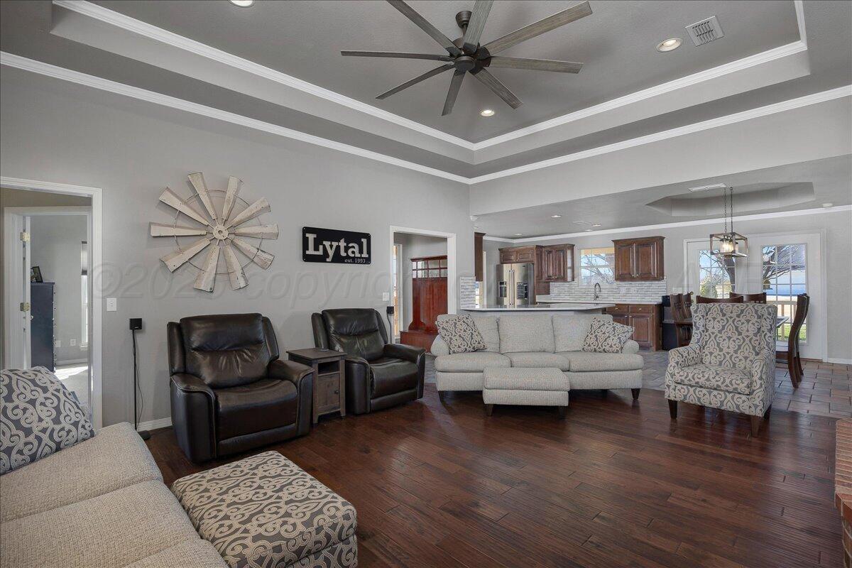 8910 Dove Road Canyon, TX 79015 - Photo 11 of 47 a living room with furniture and a wooden floor