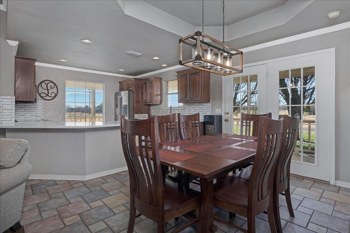 8910 Dove Road Canyon, TX 79015 - Photo 13 of 47 a view of a dining room with furniture