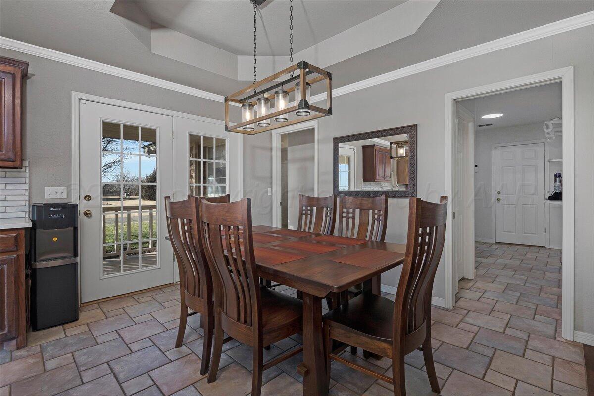 8910 Dove Road Canyon, TX 79015 - Photo 14 of 47 a view of a dining room with furniture