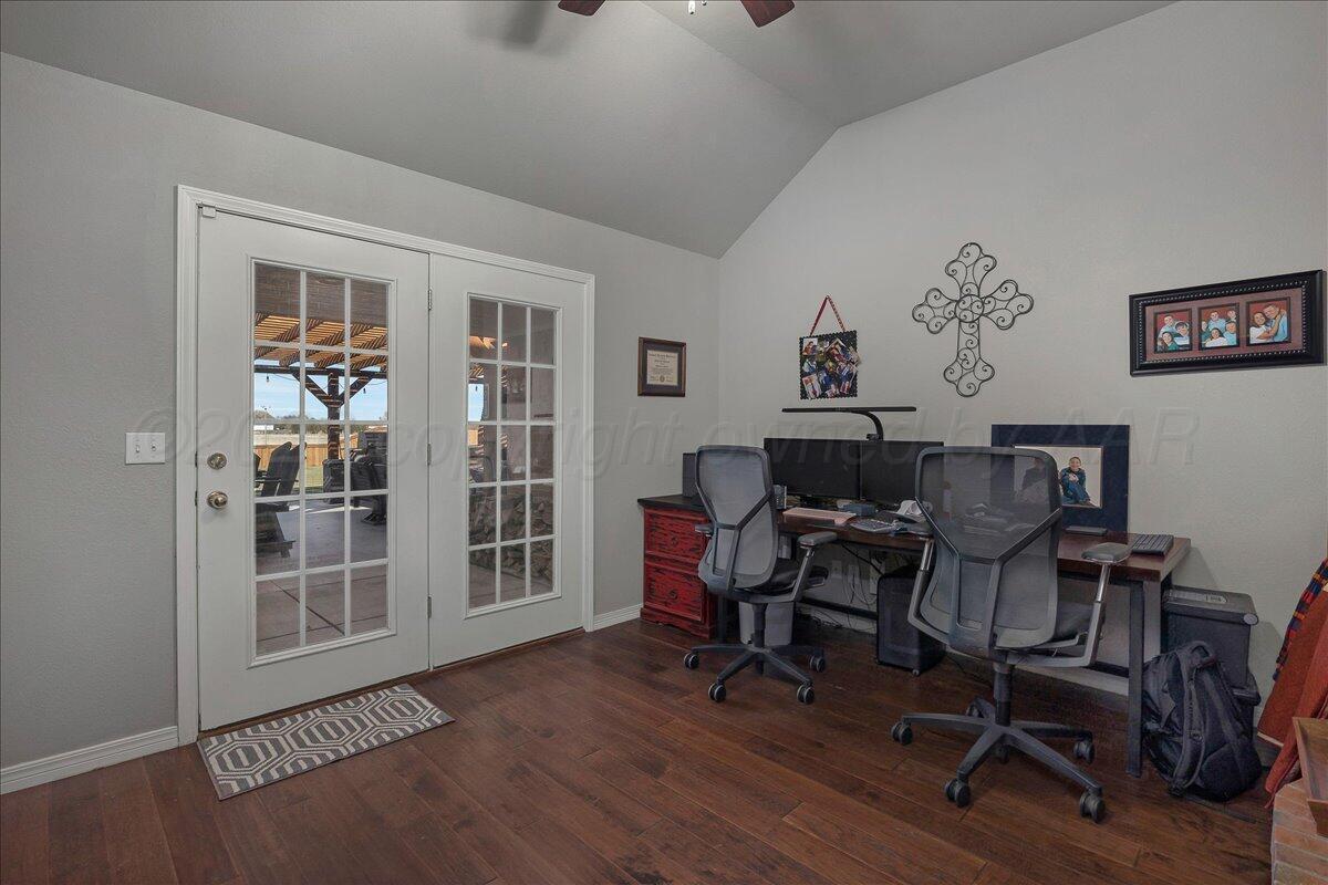 8910 Dove Road Canyon, TX 79015 - Photo 19 of 47 a workspace with wooden floor