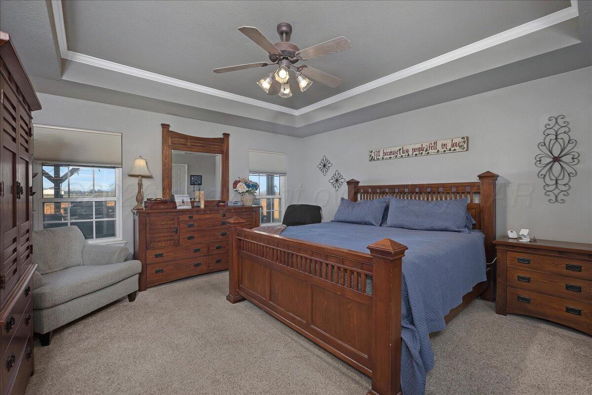 8910 Dove Road Canyon, TX 79015 - Photo 21 of 47 a bedroom with bed and furniture