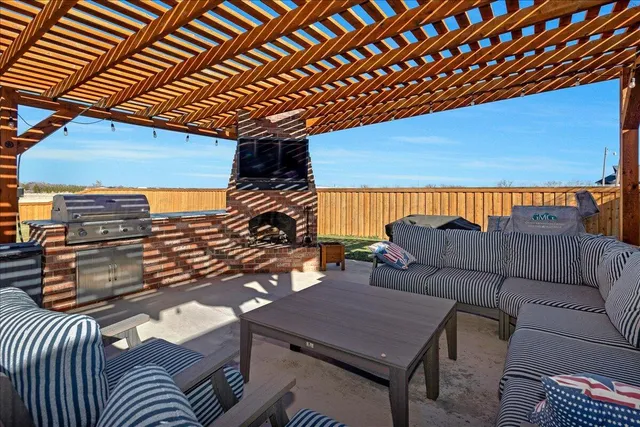 a outdoor space with patio couches and a potted plant