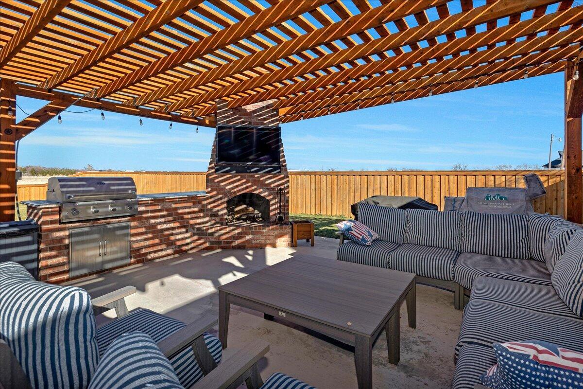 8910 Dove Road Canyon, TX 79015 - Photo 32 of 47 a outdoor space with patio couches and a potted plant