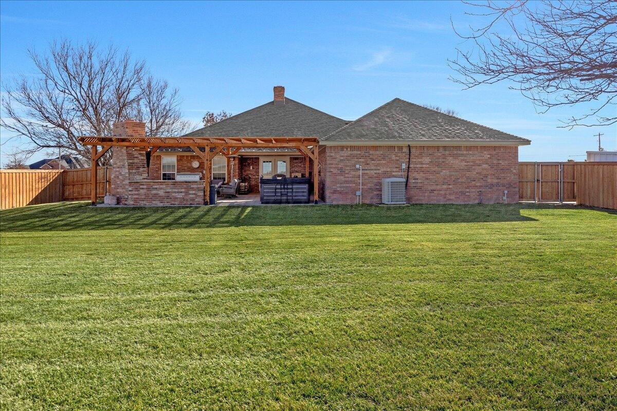 8910 Dove Road Canyon, TX 79015 - Photo 34 of 47 a view of a house with a yard