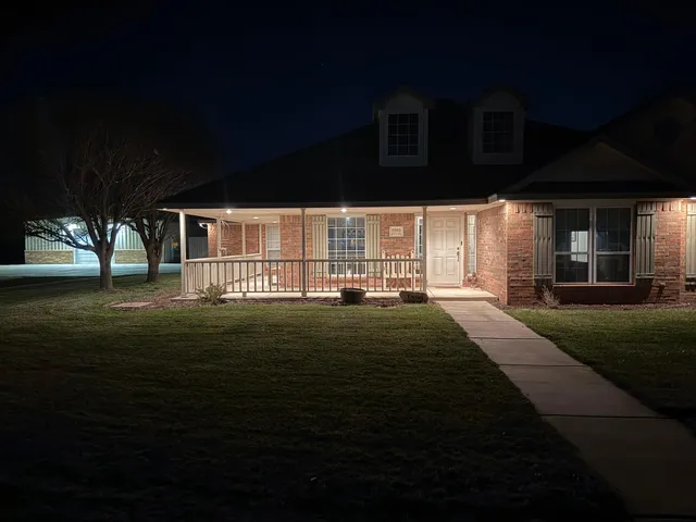 a view of house with outdoor space