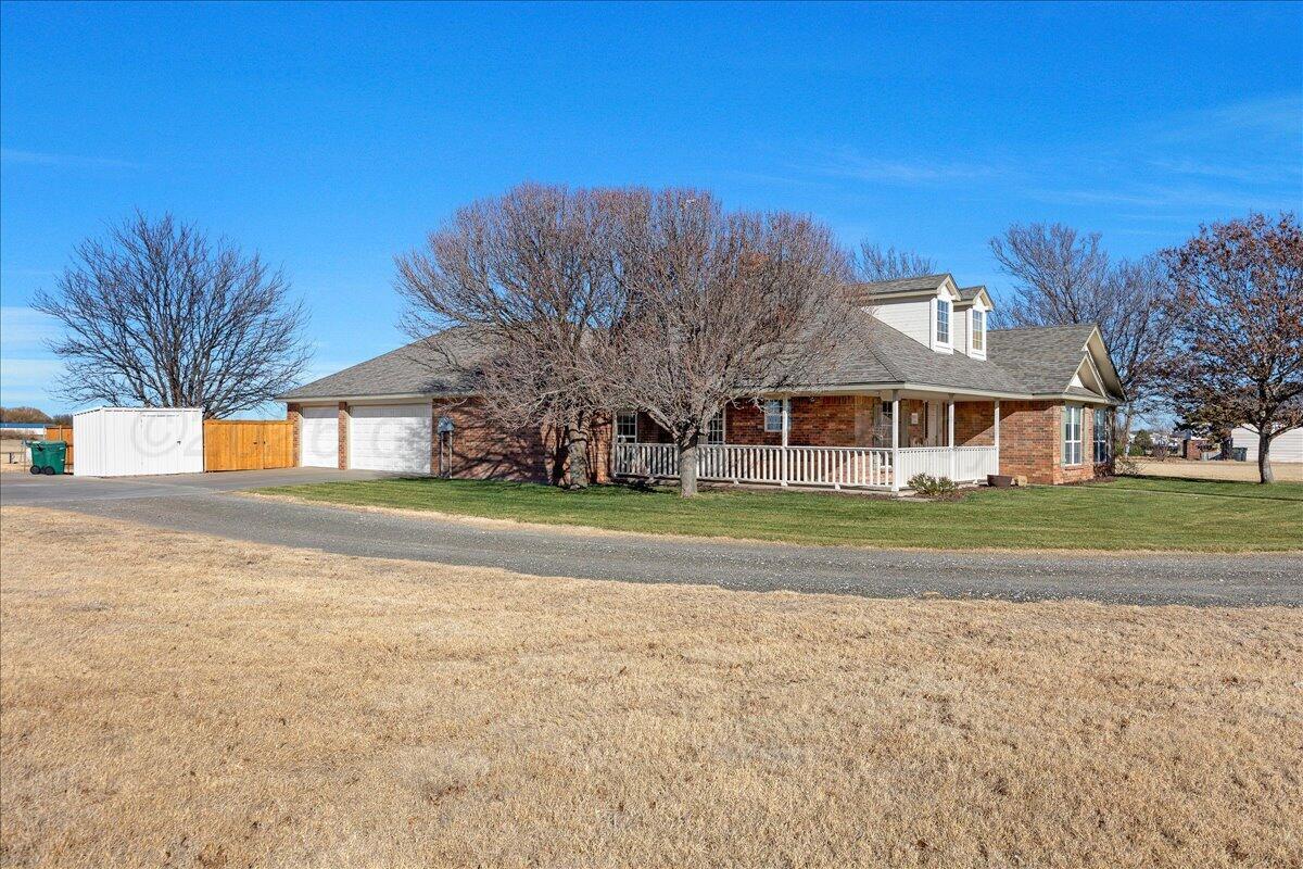 8910 Dove Road Canyon, TX 79015 - Photo 6 of 47 a view of a house with a yard
