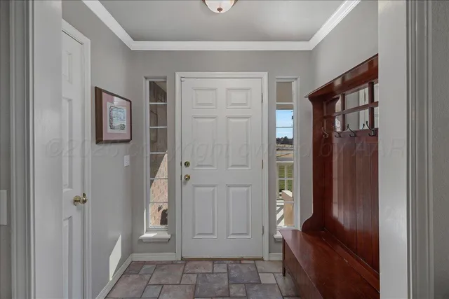 wooden floor with a bathroom