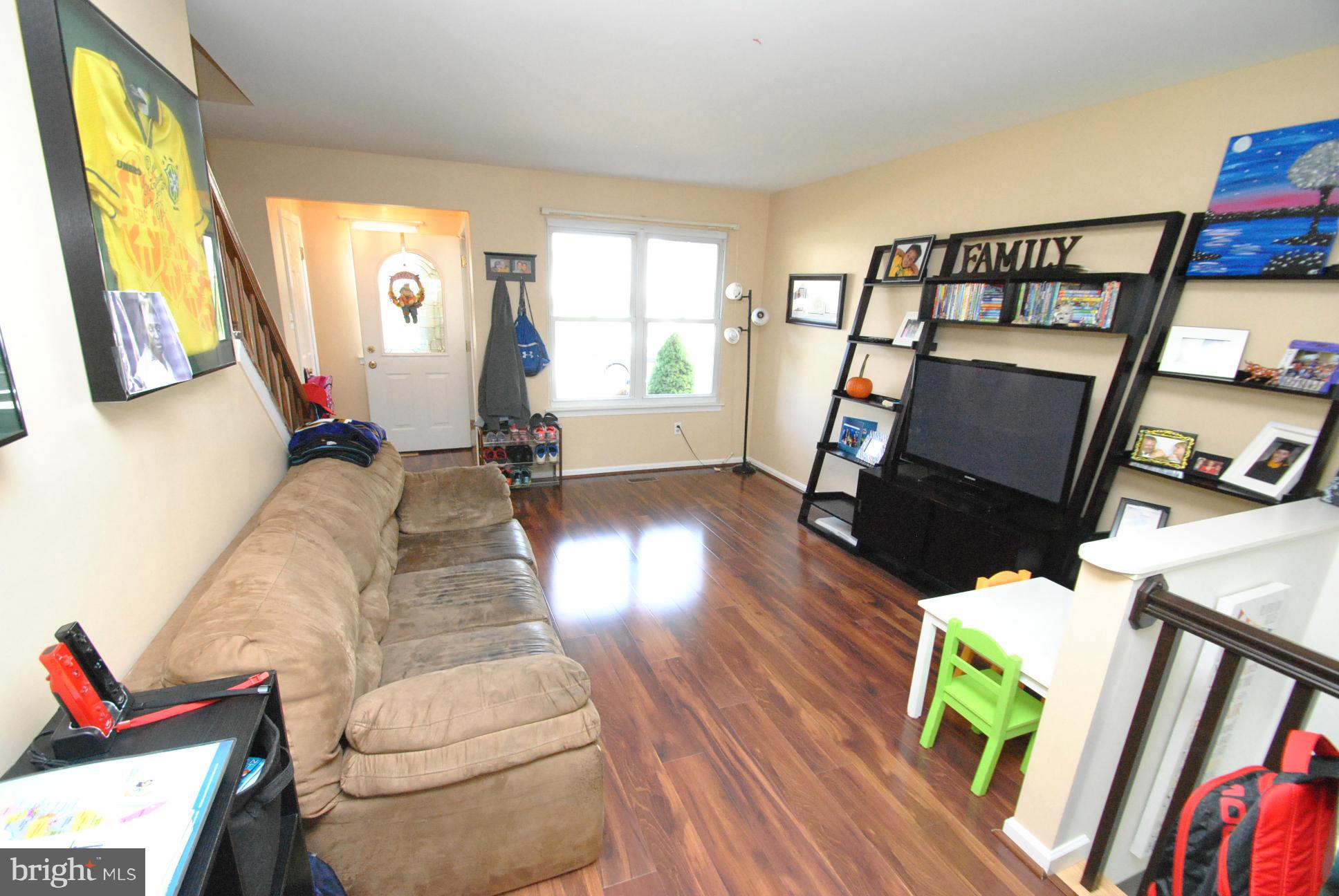 3701 Klausmier Road Baltimore, MD 21236 - Photo 4 of 30 NEW WOOD LOOK LAMINATE FLOORING THRU MAIN LEVEL
