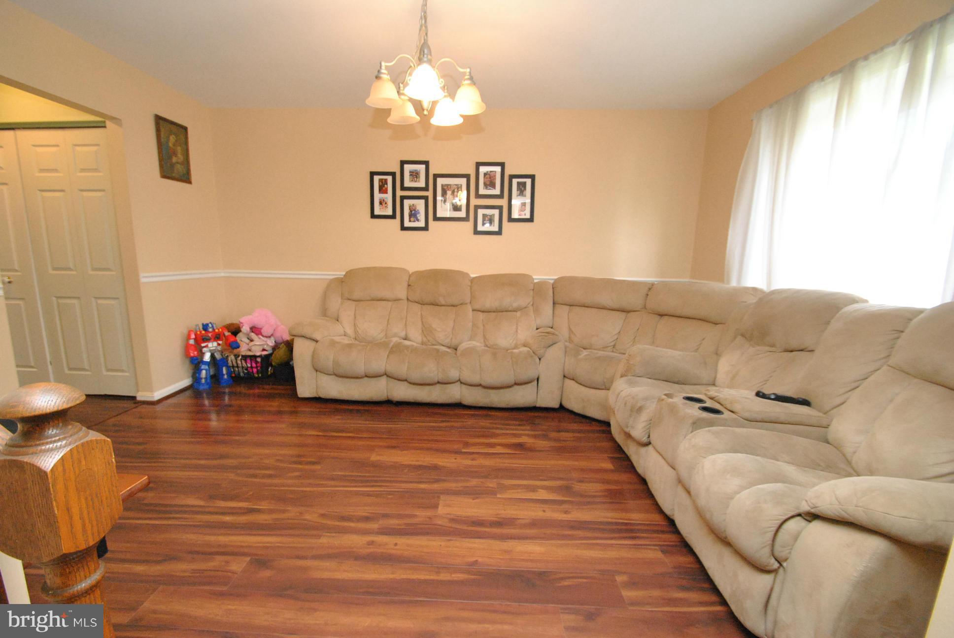 3701 Klausmier Road Baltimore, MD 21236 - Photo 9 of 30 NEW WOOD LOOK LAMINATE FLOORING THRU MAIN LEVEL