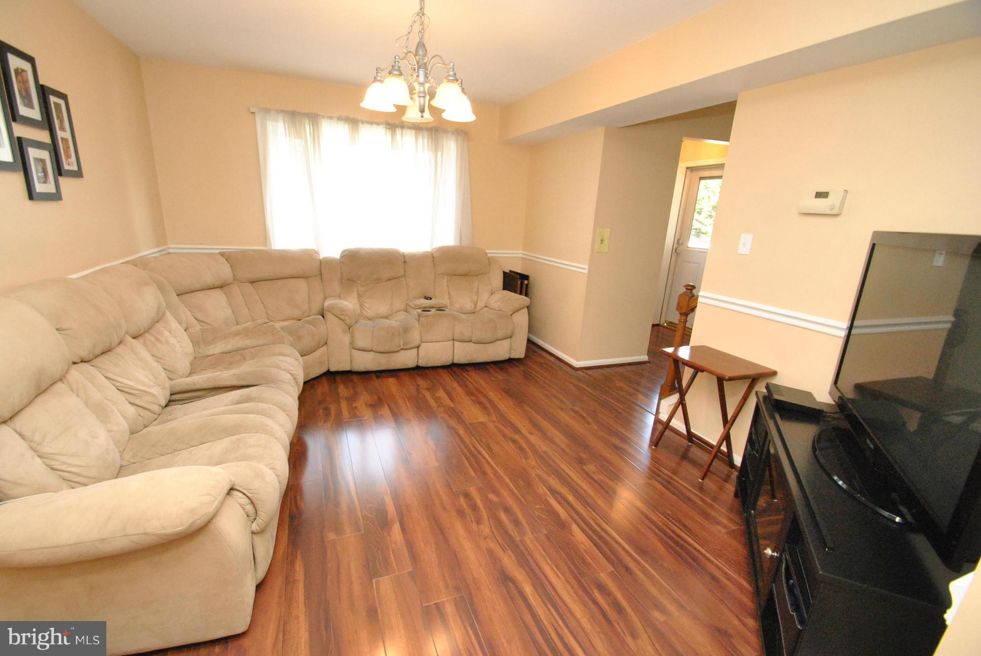 3701 Klausmier Road Baltimore, MD 21236 - Photo 10 of 30 NEW WOOD LOOK LAMINATE FLOORING THRU MAIN LEVEL
