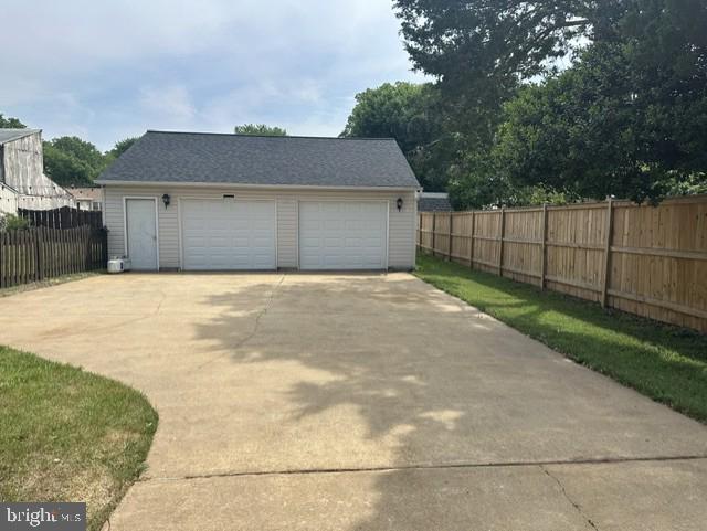 10303 Abbott Road Manassas, VA 20110 - Photo 29 of 36 a view of a house with a yard and large tree