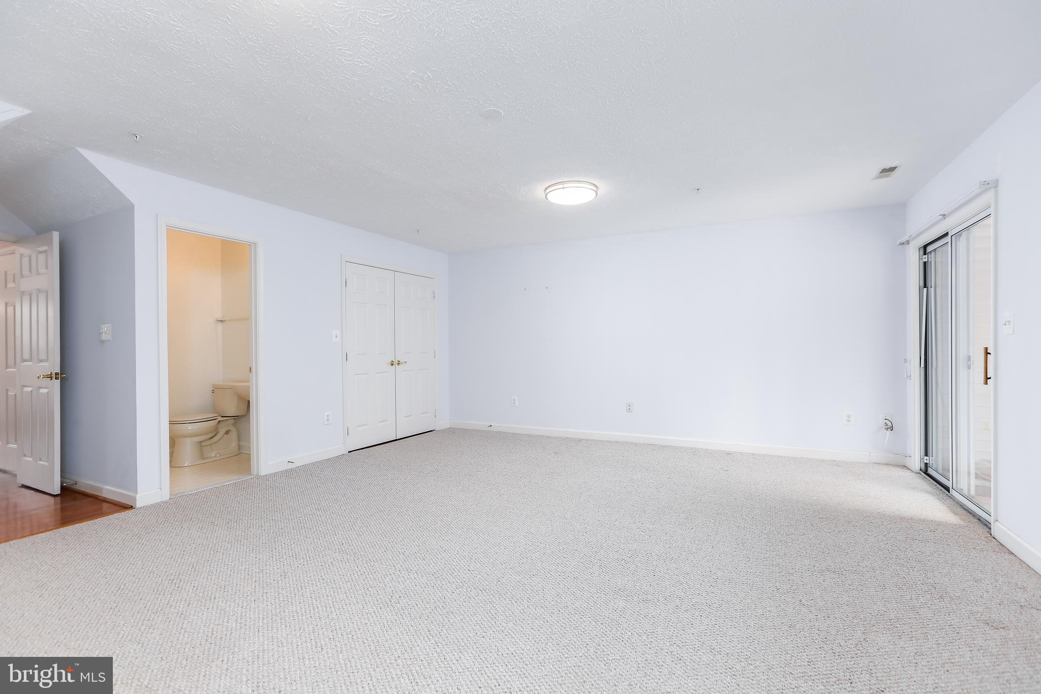 1365 Escapade Court Riva, MD 21140 - Photo 11 of 57 Rec room on ground level w/ sliders to rear patio
