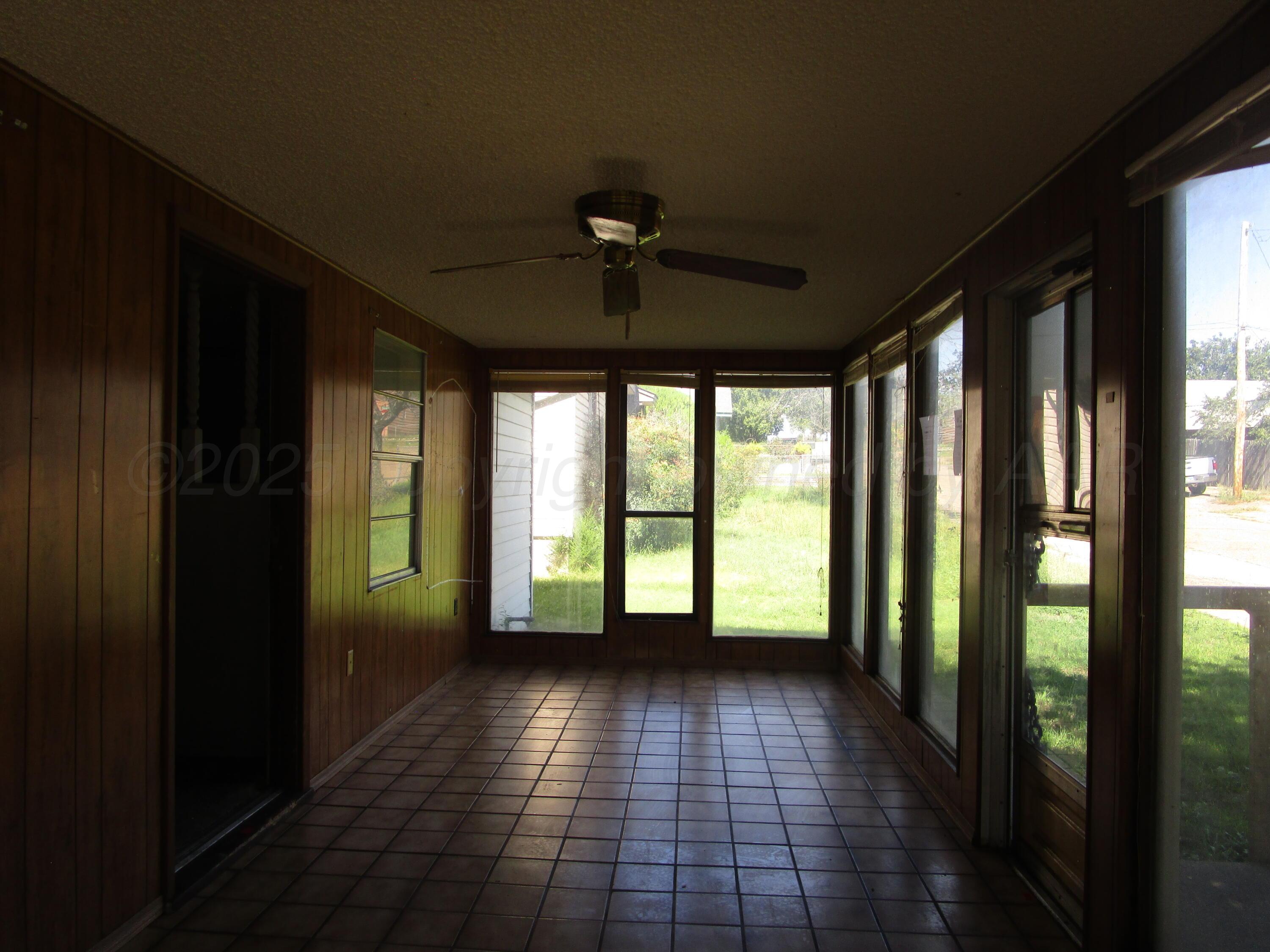 207 Chaparral Street Borger, TX 79007 - Photo 14 of 24 Enclosed Front Porch