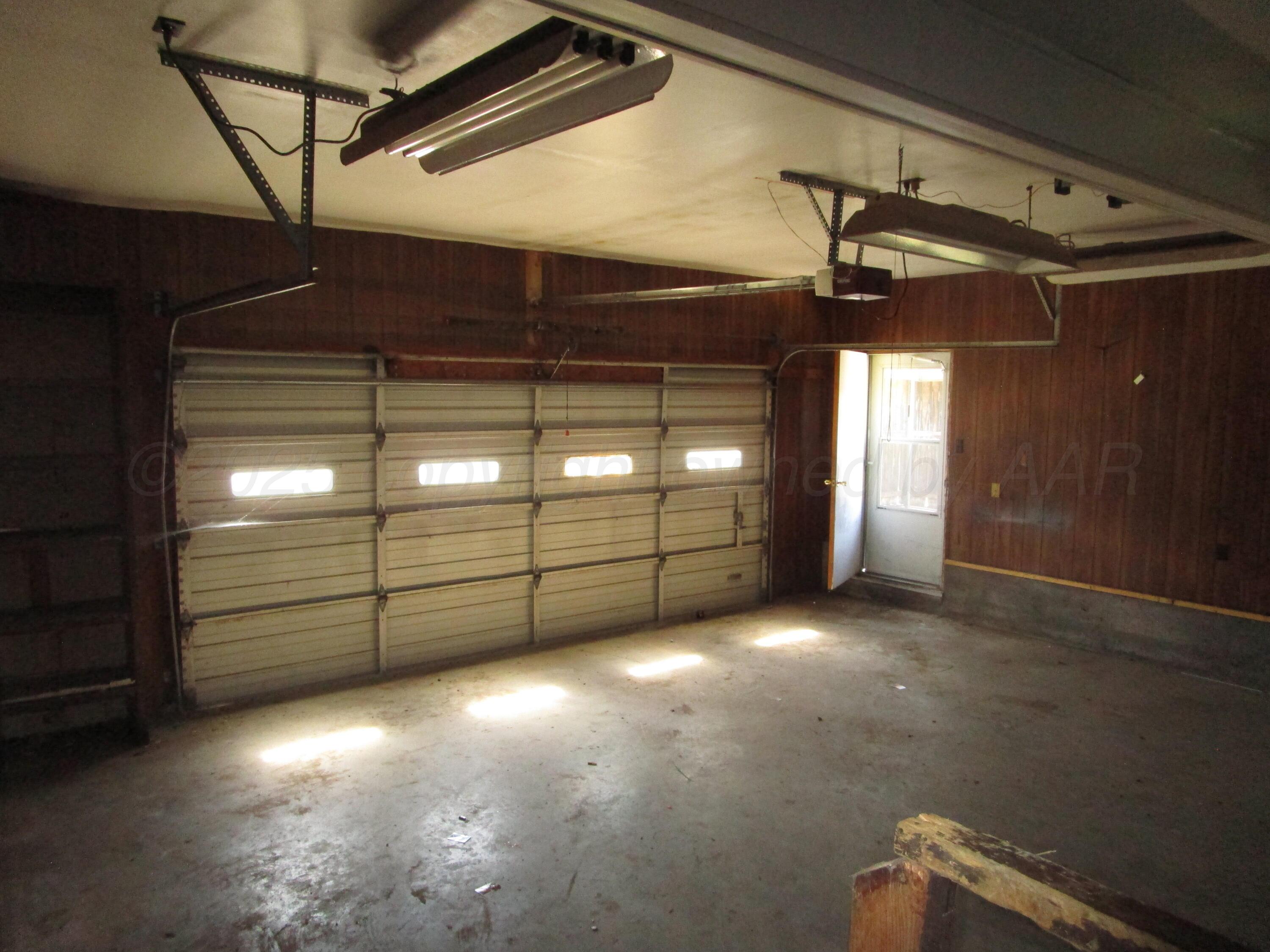 207 Chaparral Street Borger, TX 79007 - Photo 15 of 24 Inside the Garage