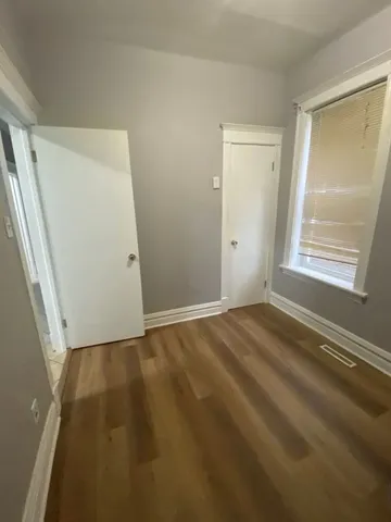 an empty room with window