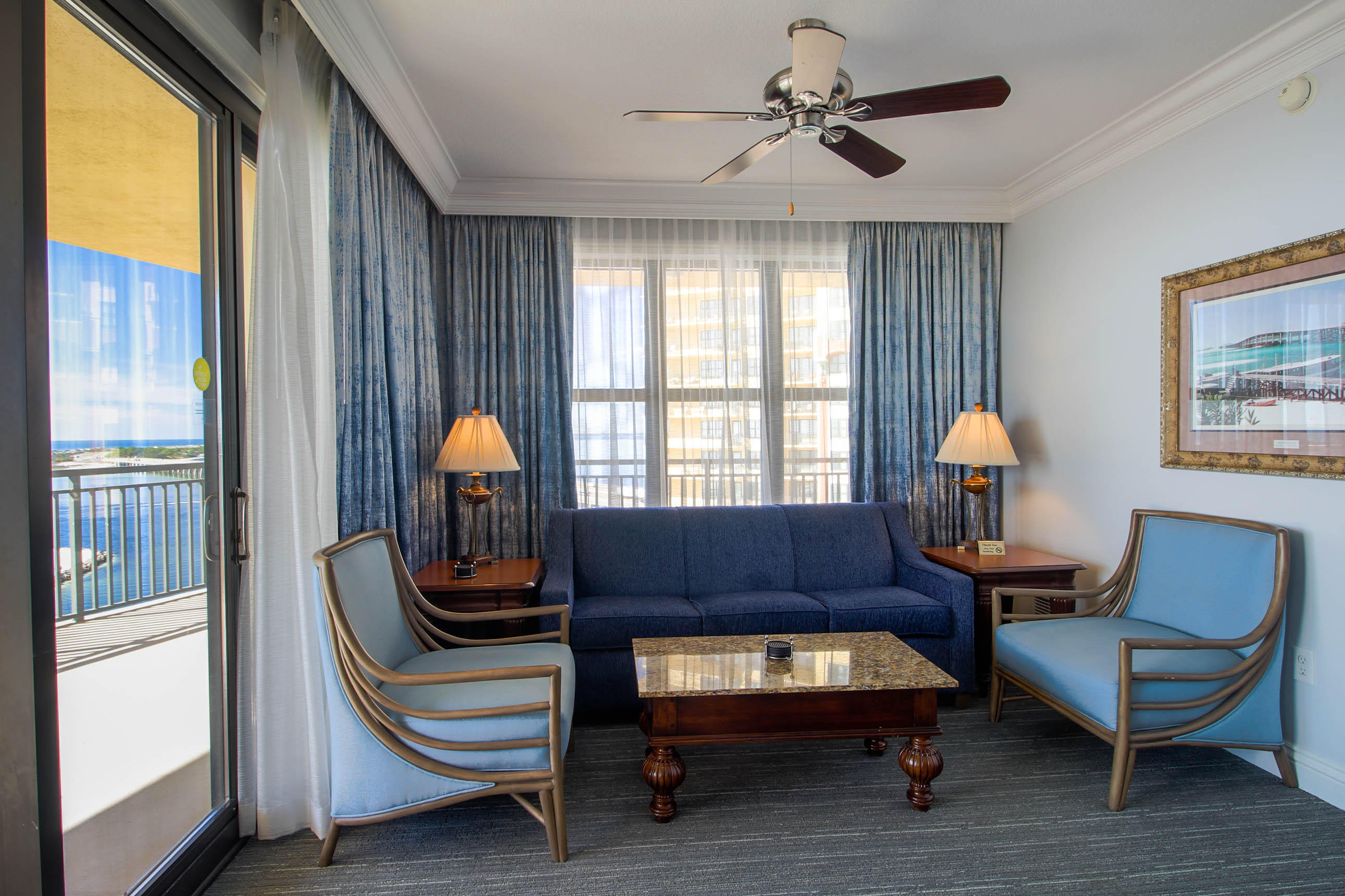 10 Harbor Boulevard, Unit E305E Destin, FL 32541 - Photo 17 of 33 a living room with furniture and a window