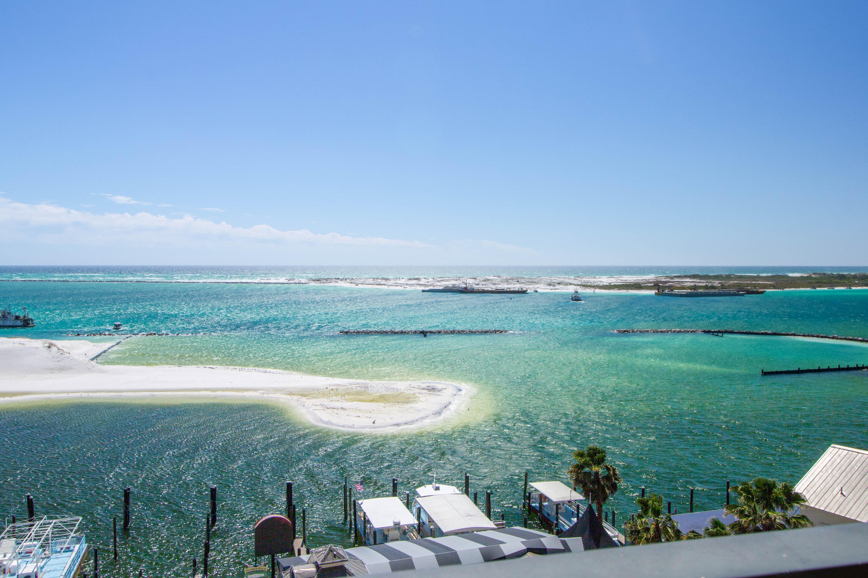 10 Harbor Boulevard, Unit E305E Destin, FL 32541 - Photo 29 of 33 a view of a lake with a yard
