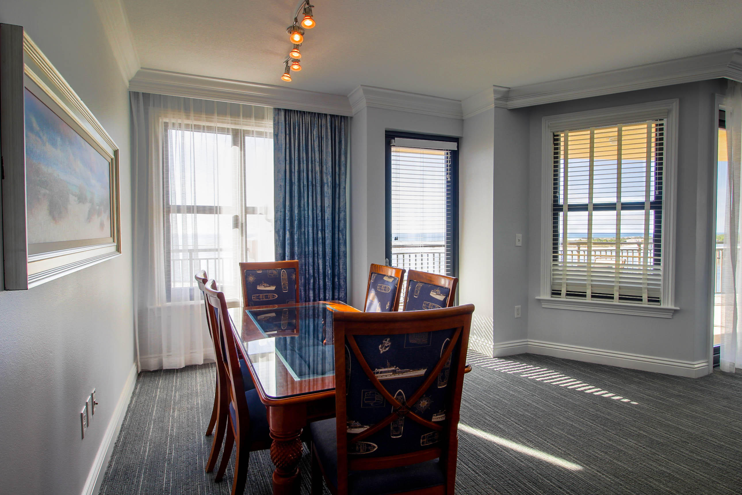 10 Harbor Boulevard, Unit E305E Destin, FL 32541 - Photo 5 of 33 a dining room with furniture and window